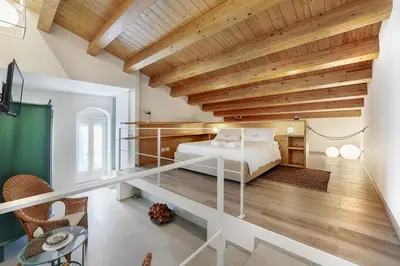 Letto o letti in una camera di HyblaLifeRooms