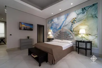 Letto o letti in una camera di Matteotti Luxury Residence