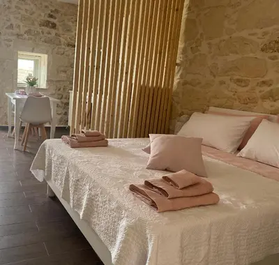 Letto o letti in una camera di Mary Home Sicily Deluxe