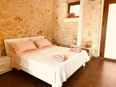 Letto o letti in una camera di Mary Home Sicily Deluxe