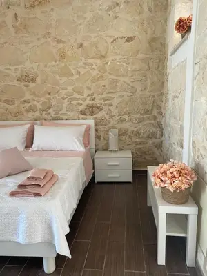 Letto o letti in una camera di Mary Home Sicily Deluxe