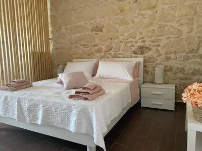 Letto o letti in una camera di Mary Home Sicily Deluxe