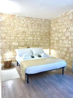 Letto o letti in una camera di Casa DaviRì