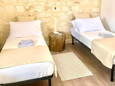 Letto o letti in una camera di Casa DaviRì