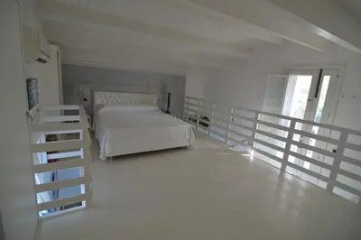 Letto o letti in una camera di Il pesce nero