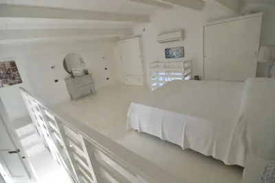 Letto o letti in una camera di Il pesce nero