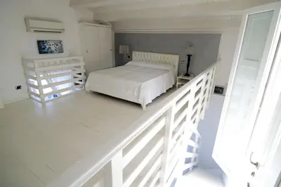 Letto o letti in una camera di Il pesce nero