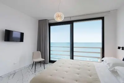 Letto o letti in una camera di Villa Hermes