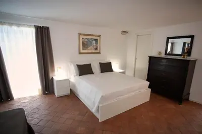 Letto o letti in una camera di Palazzo Marletta Duomo Apartment