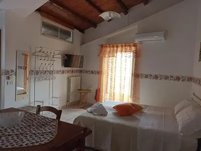 Letto o letti in una camera di CASA VACANZE BELLA VISTA