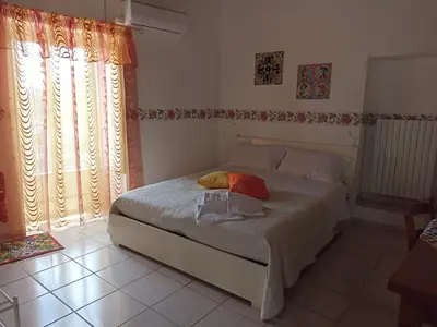 Letto o letti in una camera di CASA VACANZE BELLA VISTA