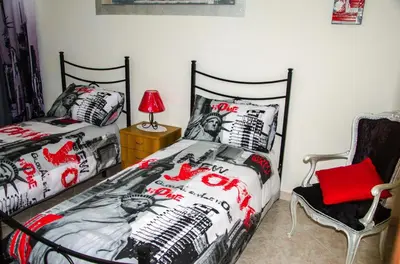 Letto o letti in una camera di Casa Vacanze Epicarmo