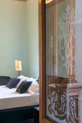 Letto o letti in una camera di DIMORA PATERNÒ DEL GRADO