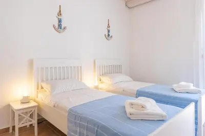 Letto o letti in una camera di Sea view New Apartment Ortigia