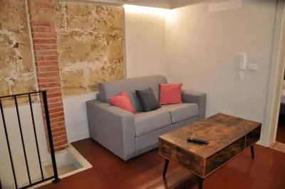 Area soggiorno di Liolà's Home