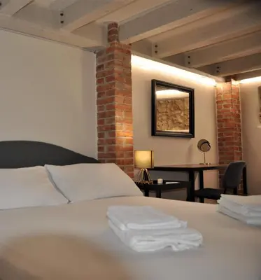 Letto o letti in una camera di Liolà's Home