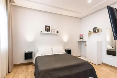 Letto o letti in una camera di Cortile Siciliano Apartments
