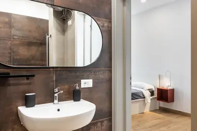 Bagno di Cortile Siciliano Apartments