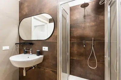 Bagno di Cortile Siciliano Apartments