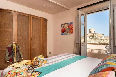 Letto o letti in una camera di Lùme