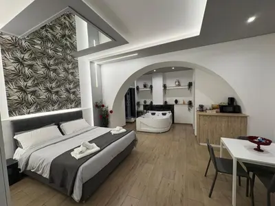 Letto o letti in una camera di Catania Station Luxury Suite