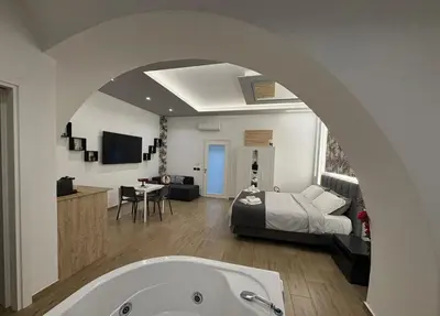 TV o dispositivi per l'intrattenimento presso Catania Station Luxury Suite