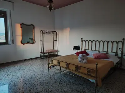 Letto o letti in una camera di Soffitti colorati