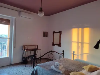 Letto o letti in una camera di Soffitti colorati
