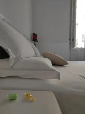 Letto o letti in una camera di B&B Palazzo Sant'Alfano
