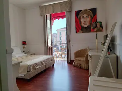 Letto o letti in una camera di B&B Palazzo Sant'Alfano
