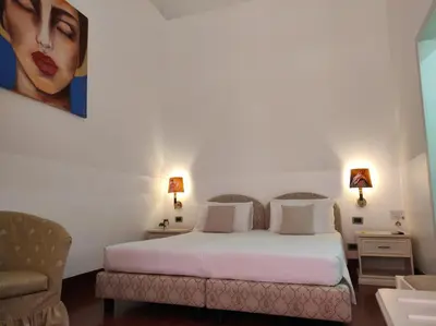 Letto o letti in una camera di B&B Palazzo Sant'Alfano