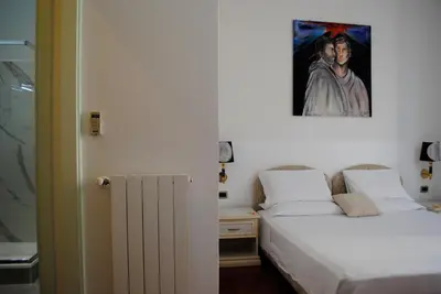 Letto o letti in una camera di B&B Palazzo Sant'Alfano