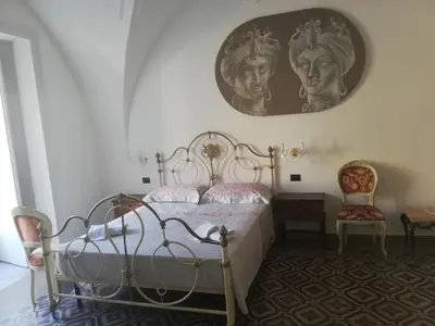 Letto o letti in una camera di Terra d'Amuri Hotel Boutique