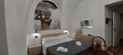 Letto o letti in una camera di Terra d'Amuri Hotel Boutique
