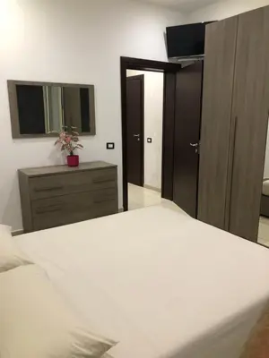 Letto o letti in una camera di Terrazza famà