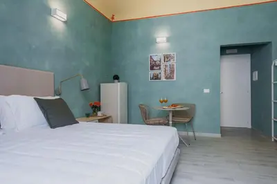 Letto o letti in una camera di Five Stars Sicily Sirio by Ortigia Apartments