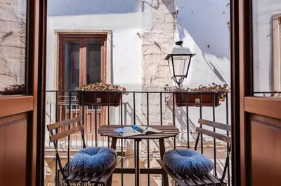Area soggiorno di Five Stars Sicily Sirio by Ortigia Apartments