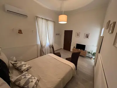 Letto o letti in una camera di Zinbi’s House