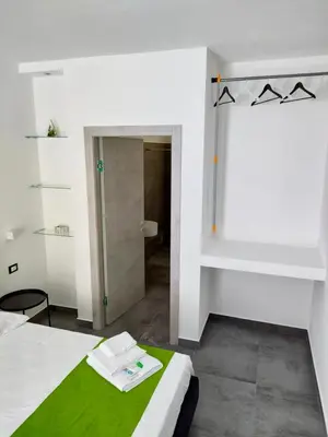 Letto o letti in una camera di B&b Leo