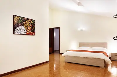 Letto o letti in una camera di Liodoro Apartment Catania