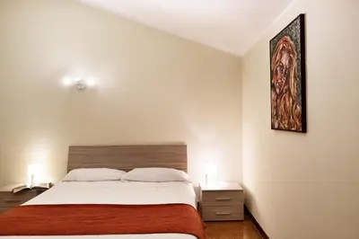 Letto o letti in una camera di Liodoro Apartment Catania