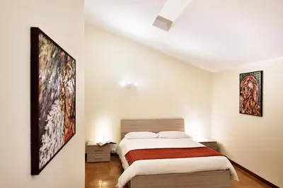 Letto o letti in una camera di Liodoro Apartment Catania
