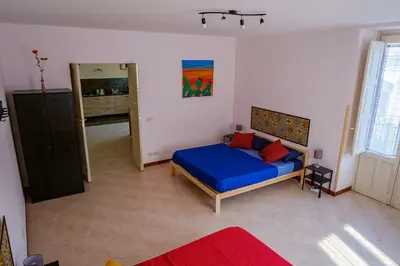 Letto o letti in una camera di U Passiaturi Big House