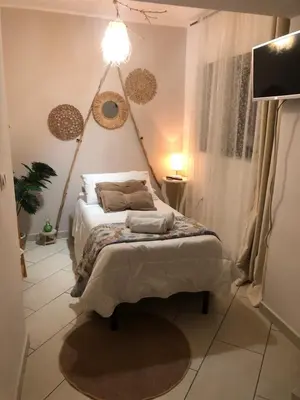 Letto o letti in una camera di Nicaredda Guest Rooms
