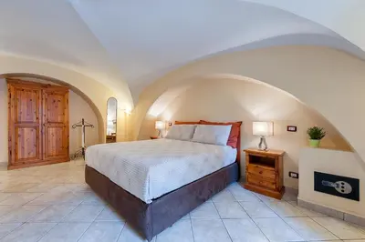 Letto o letti in una camera di Case Vacanze Catania