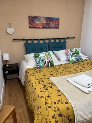 Letto o letti in una camera di ORTIGIA 26