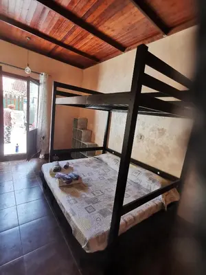 Letto o letti in una camera di Casa Nina