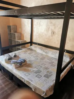 Letto o letti in una camera di Casa Nina