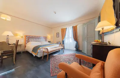 Letto o letti in una camera di Algilà Ortigia Charme Hotel