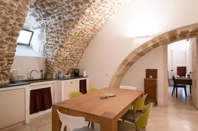 Cucina o angolo cottura di Deluxe Dammuso in Centro Storico